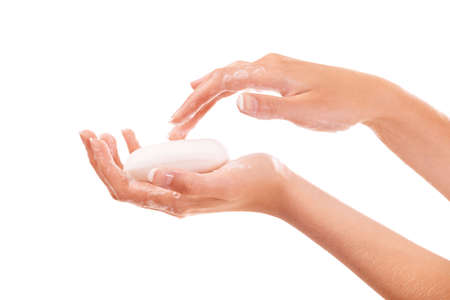 Her soap is specially made. Cropped shot of a woman washing her hands with soap.