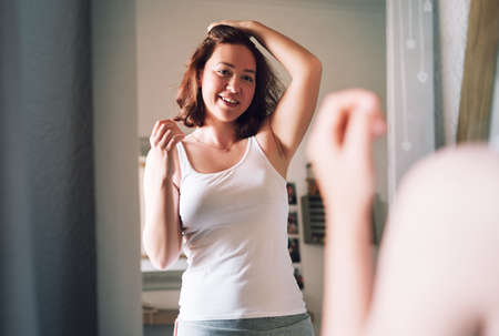 I have to say I look pretty good with this hair style. Cropped shot of an attractive young woman...
