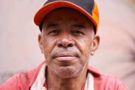 Hes lived quite the life. Cropped shot of a mature ethnic man.の写真素材