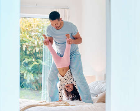 Here, love knows no end. Shot of a man playing with his daughter at home.