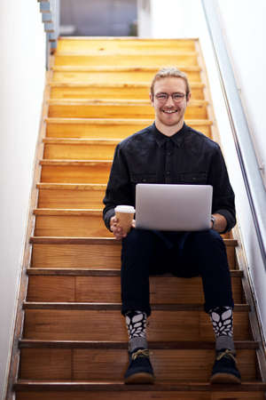 One is always busy when building a brand. Full length portrait of a handsome young businessman...
