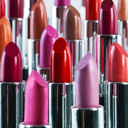 Bright and bold - just like you. A studio shot of different coloured lipsticks.の写真素材