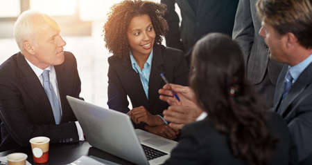 Giving them the details. Cropped shot of a group of businesspeople in a meeting.