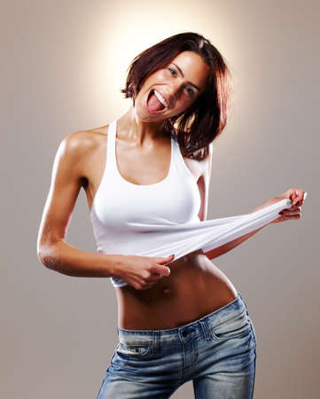 Get your body moving. Studio shot of an attractive woman dancing.