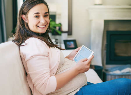 This pregnancy has been a breeze so far. Cropped portrait of an attractive young pregnant woman...