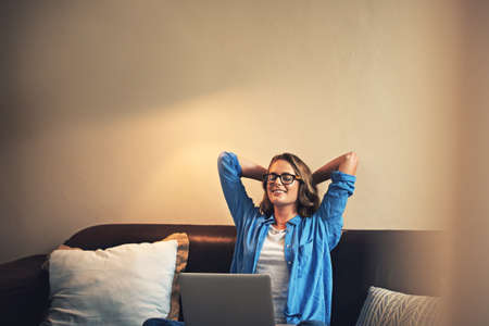 Im sure my followers will enjoy this blog post. Shot of a relaxed young woman using a laptop on the...