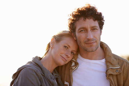 All we need is each other. A cropped portrait of a happy man and his wife standing affectionately outdoors.の写真素材