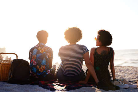 Friends are the ones that make life worth living. Rearview shot of an unrecognizable diverse trio of...
