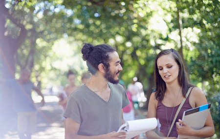 Catching up before the next class. Cropped shot of a male and female student on campus.