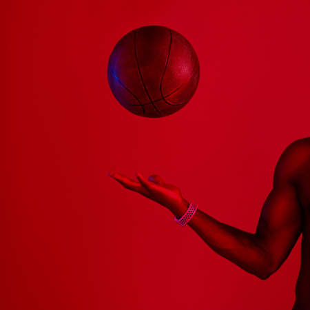 What you do with it is up to you. Red filtered shot of an unrecognizable sportsman posing with a...