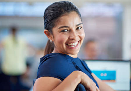 You could be smiling too. Portrait of a beautiful young businesswoman sitting at her laptop.