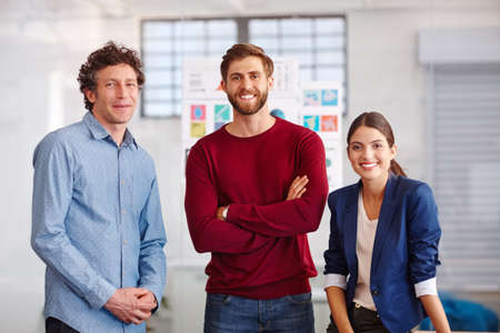 The dream design team. Portrait of a group of creative professionals in the office.の写真素材