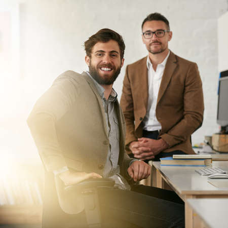Working together is success. Cropped shot of two designers in an office.