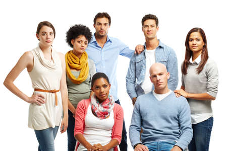 Taking life very seriously. Group of casually dressed young adults looking serious against a white...
