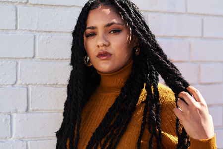 Im a woman and Im always ready to stand up for myself. Cropped shot of a beautiful young woman out...