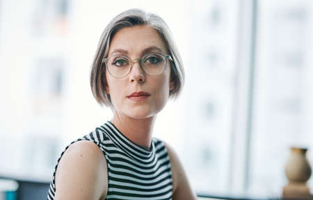 I have years of experience in this game. Cropped shot of a mature businesswoman in her office.