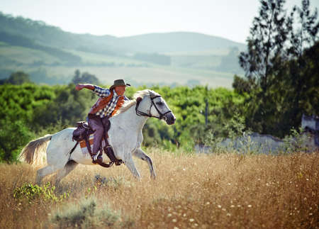 Yeeha. A cowboy on his horse.
