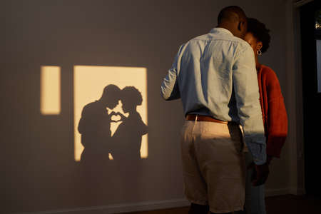 Love got us here. Shot of an unrecognizable couple standing together and sharing an intimate moment...