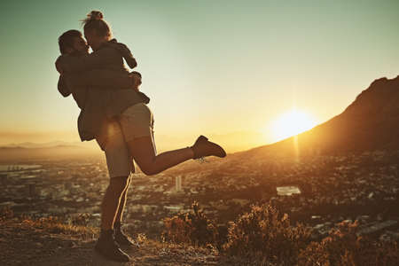 Theyre the definition of relationship goals. Cropped shot of an affectionate couple spending the day outdoors.の写真素材
