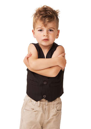 I dont want to. A cute little boy posing on a white background.