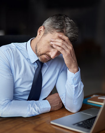 The pursuit of success comes with its fair share of stress. Cropped shot of a mature businessman...