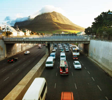 Home time in the city. Shot of a traffic on the motorway.の写真素材