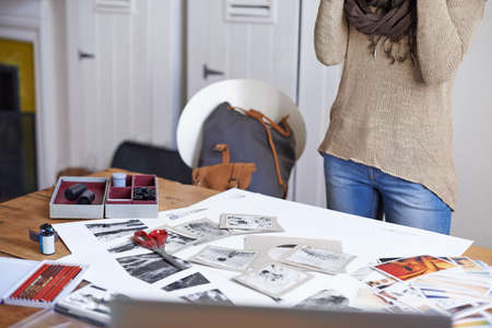 We all have hobbies - Scrapbooking. A photographer taking a snapshot with her camera.