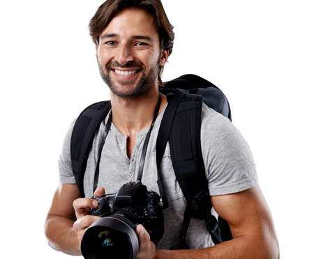 All you need is the right equipment. A handsome photographer smiling at the camera.