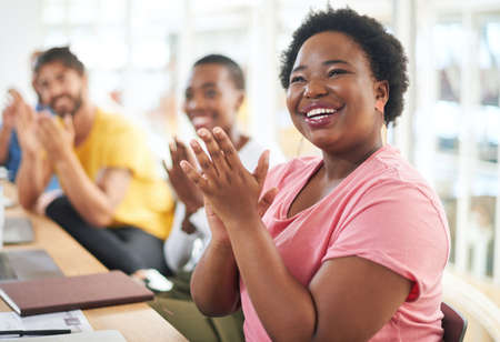 Another month, another target smashed. Shot of a group of businesspeople clapping during a meeting...