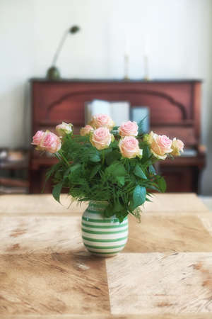 Pink roses. A beautiful red and pink roses in a vase.の写真素材