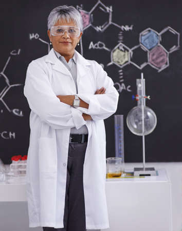 Shes a respected member of the faculty. A senior female scientist working in her lab.の写真素材