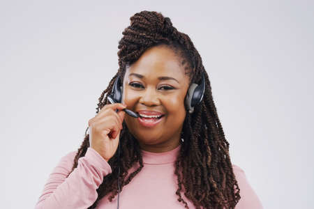 Im always ready to help my clients. Studio portrait of an attractive young female customer service...