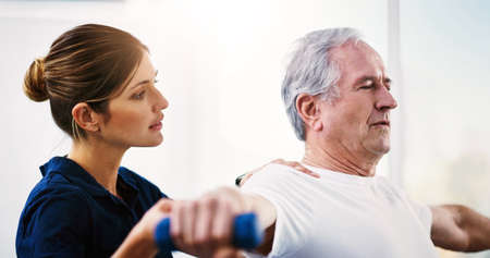 Regular exercise is vital as you grow older. Shot of an attractive young female physiotherapist...