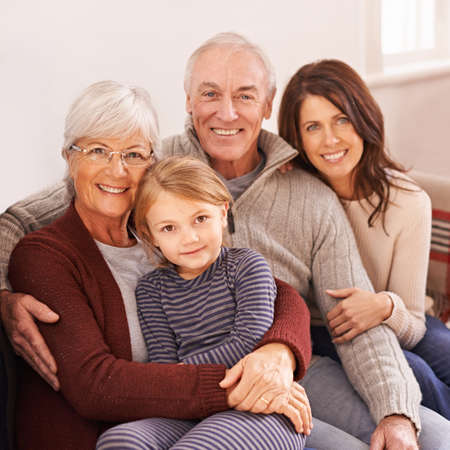 You can feel the warmth of their love. A cropped portrait of a happy multi-generation family sitting...