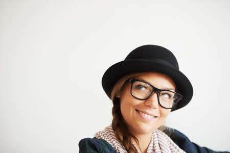 Shes got the trends down. A young hipster girl in studio.の写真素材