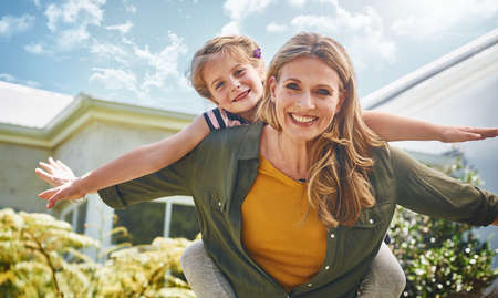 Our love is beyond words. Portrait of a mother and her little daughter bonding together outdoors.