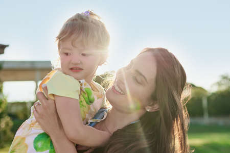 My daughter instantly brightens all of my days. Shot of a mother bonding with her little daughter outdoors.の写真素材