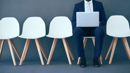 Last online research before I go for the interview. Studio shot of an unrecognizable corporate...