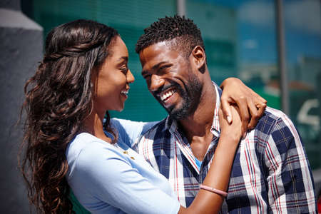I want you this close to me. Shot of a happy couple spending time outdoors.の写真素材