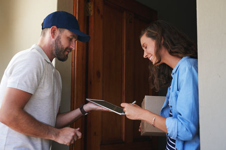 Our services are one of the easiest to use. Shot of a young woman using a digital tablet to sign for...