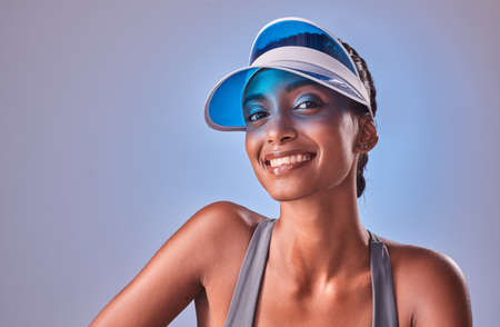 Good health is the quickest shortcut to happiness. Studio shot of a fit young woman posing against a grey background.の写真素材