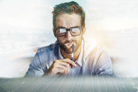 Solving problems in the busy business world. Multiple exposure shot of a mature businessman problem...