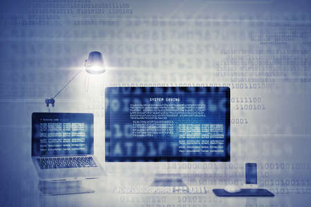 Studio shot of a laptop and computer at a workstation- ALL design on this image is created from...