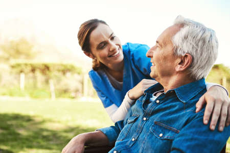 As long as youre happy, Im happy too. Cropped shot of a young female nurse outside with a senior...
