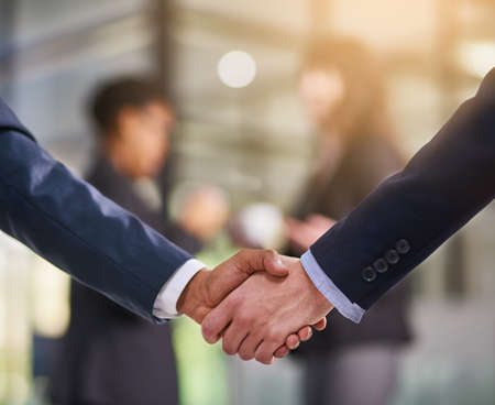 Its been great doing business together. Shot of businesspeople shaking hands.の写真素材