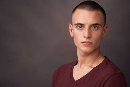 Confidence unlocks every opportunity in life. Studio shot of a handsome young man looking at the...