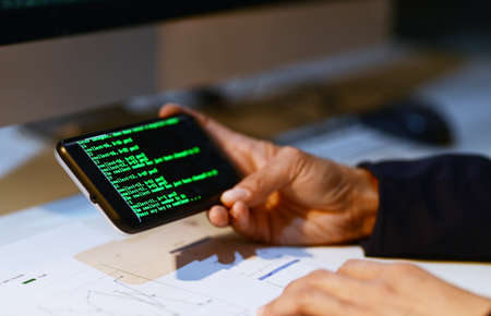 Cyberspace is open for all. Closeup shot of an unrecognizable businesswoman using a cellphone in an...