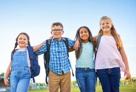 Friends make everything fun. Shot of a group of elementary school children together.