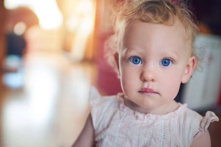 Cute just got way cuter. Portrait of an adorable little girl at home.