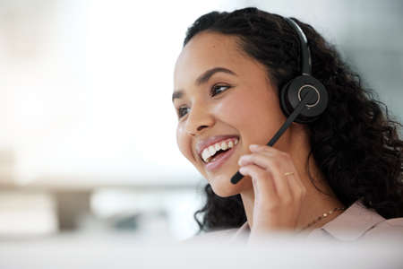 Its about creating a memorable experience for the customer. Shot of a young call centre agent...